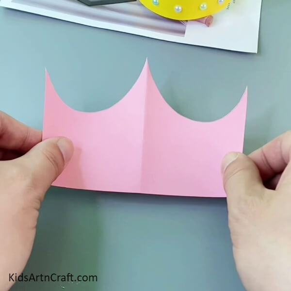 Cutting Out The Crown- Create your own paper crown with the kids