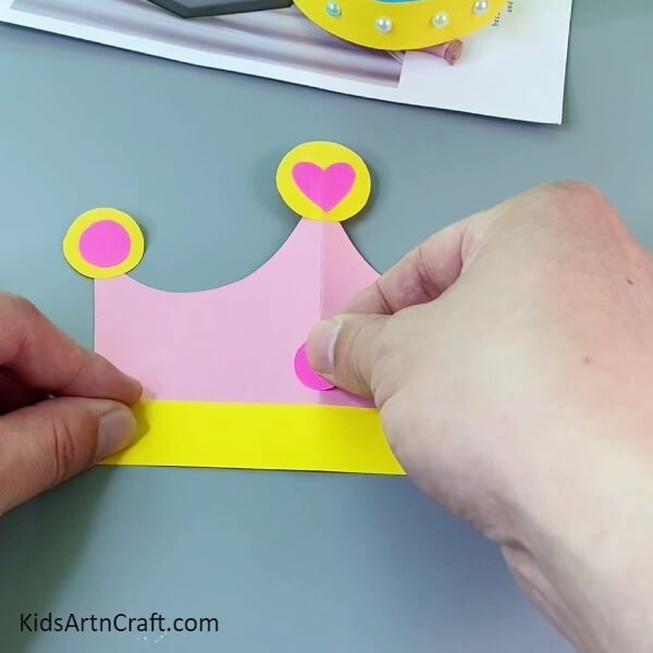 Adding Pink Circle- Get the kids to make their own paper crowns