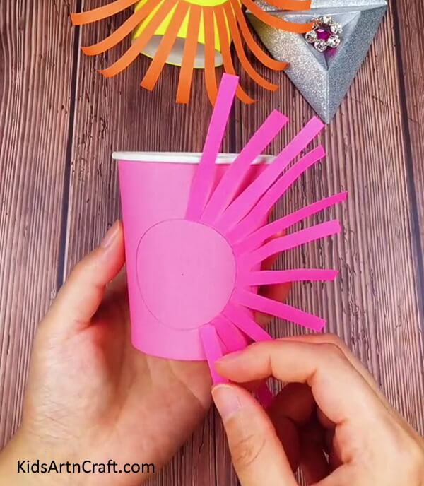 Pasting More Strips - Easy DIY Lion Craft Using A Paper Cup For Children