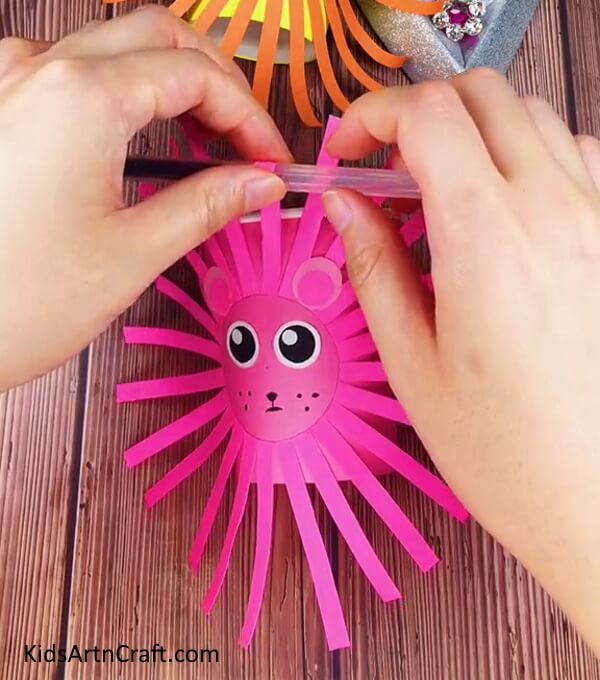 Shaping The Stripy Hair - An Enjoyable Paper Cup Lion Craft For Kids