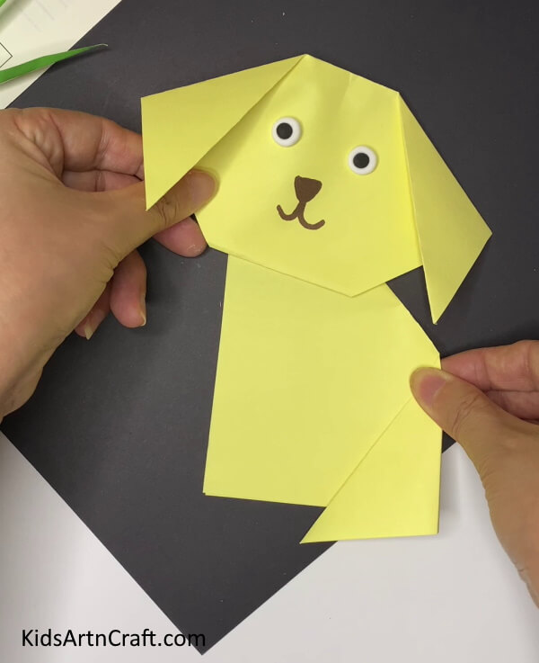 Pasting The Body and Face A DIY paper dog craft tutorial for kids to follow