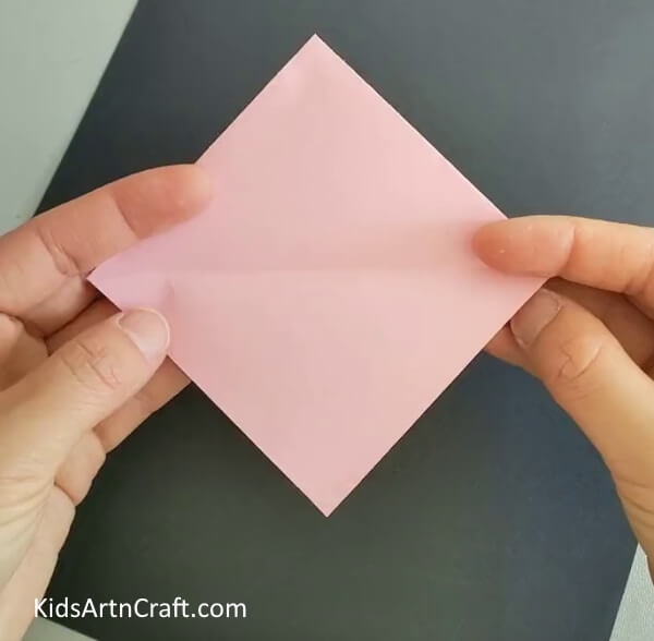 Making A Horizontal Crease On Paper- Learn how to make a Kusudama Paper Flower Origami through a DIY tutorial. 
