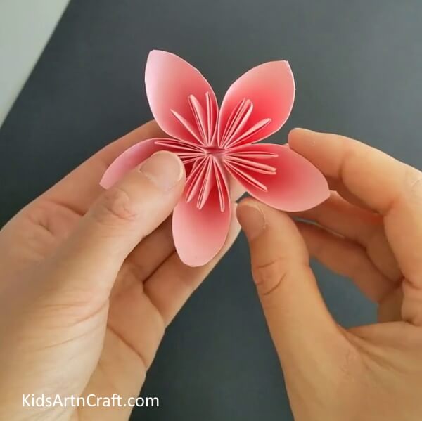 Making A Flower- Utilize a DIY tutorial to learn how to make a Kusudama Paper Flower Origami
