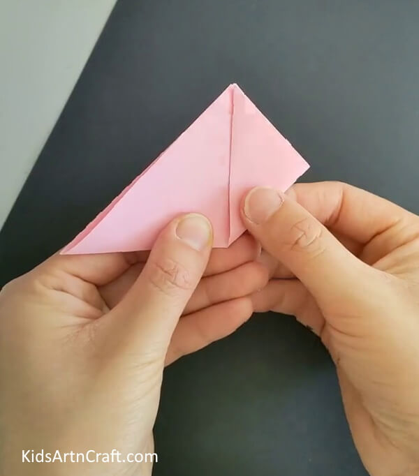 Folding The Right Corner To The Mid-Top- This DIY tutorial will show you how to create a Kusudama Paper Flower Origami.