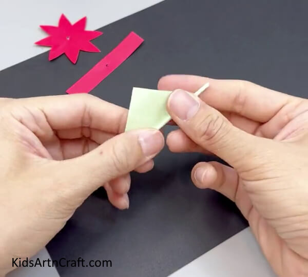 Folding The Square Paper - Learn how to construct a Paper Flower Ring with this tutorial for kids