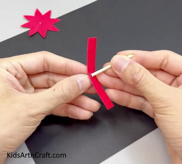  Inserting The Paper Stick Into The Rectangular Strip - A guide to making a Paper Flower Ring for children