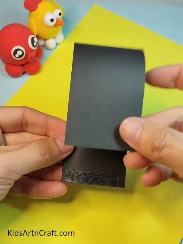 Folding the strip- Construct a Paper Mouse with the help of kids 