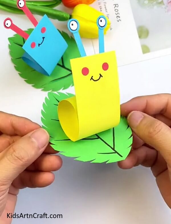 Your Craft s Ready- Try making a paper snail craft for your toddler to do in the home.