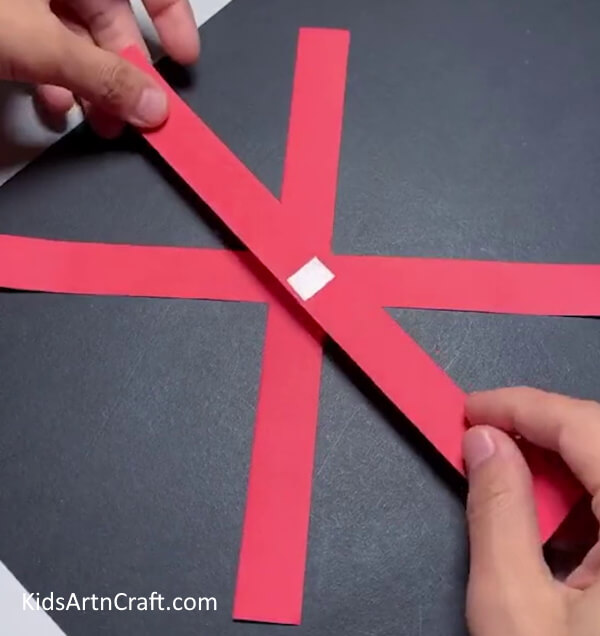 Cutting Red Color Paper- Instructions for Making a Paper Strips Flower with Your Own Hands 