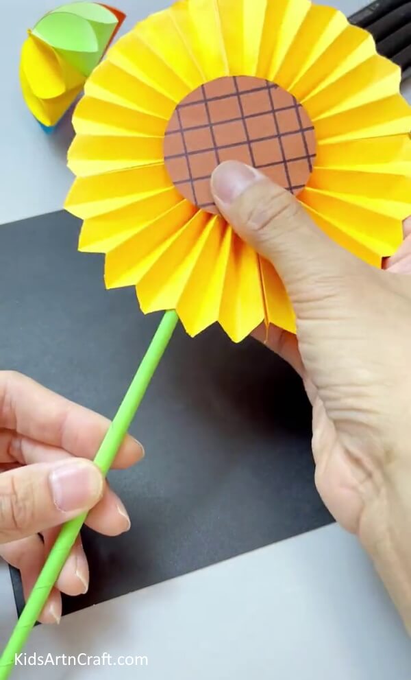 Adding A Stem To The Flower - Creating Sunflower Art and Crafts from Paper with Kids