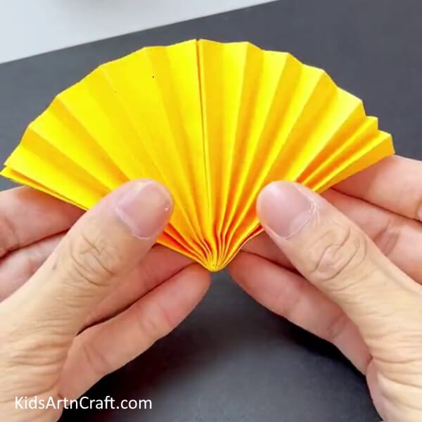 Unfolding The Strips - Paper Sunflower Art and Craft Projects for Kids