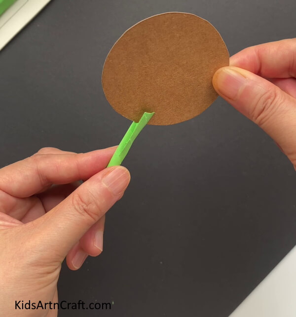 Pasting The Stem On A Brown Paper - Crafting Sunflowers From Paper: An Enjoyable Task For Children 