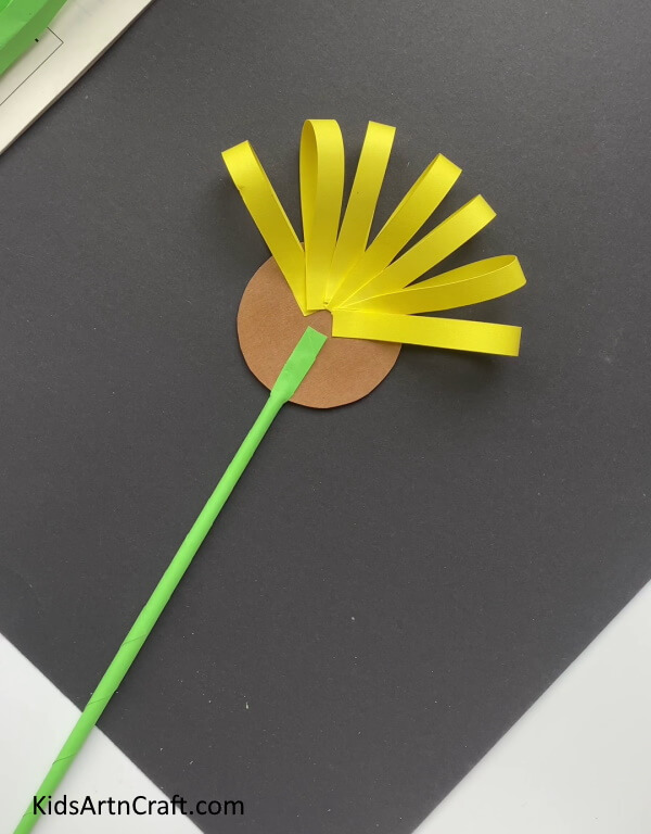 Pasting More Yellow Strips -Designing Sunflowers With Paper: A Task For Little Ones To Make 