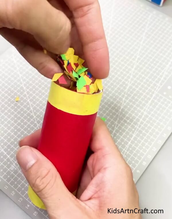 Adding Confetti In Roll - Directions for creating a party popper in a few easy steps