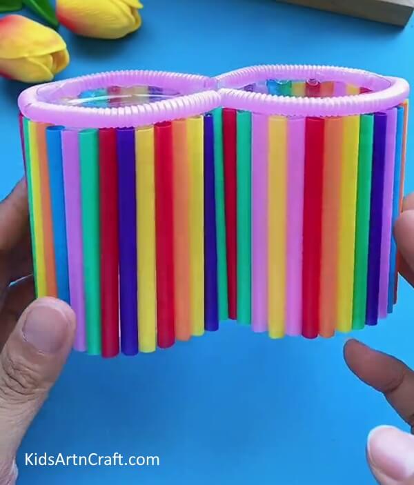 Letting It Dry- Making your own pencil holder with plastic bottles and pipe cleaners. 