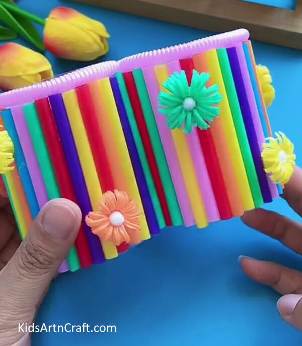 Decorating Pencil Holder- Put together a pencil holder with nothing more than plastic bottles and pipe cleaners.
