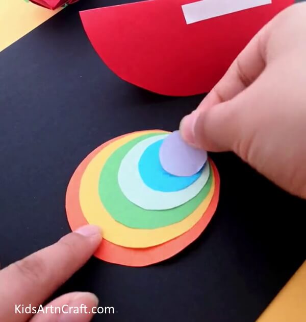 Adding More Colors - Have kids make a paper snail craft with a rainbow of colors.