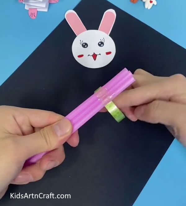 Joining 3 Plastic Straws Together-Construct a Bunny Toy with Straws and Paper Cups For Youngsters