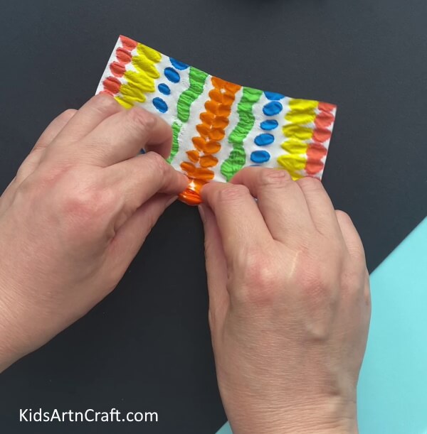 Folding Pleats - Reuse Tissue Paper to Put Together a Butterfly Craft Idea for Little Ones