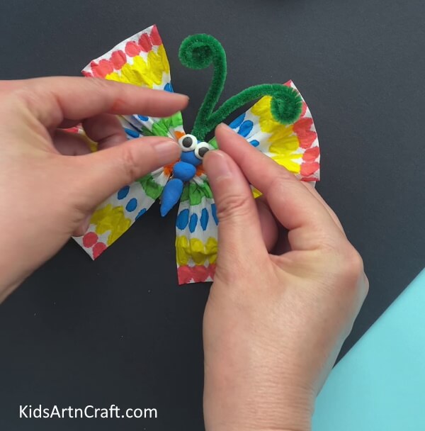 Pasting Eyes - Repurpose Tissue Paper into a Butterfly Art Piece for Kids