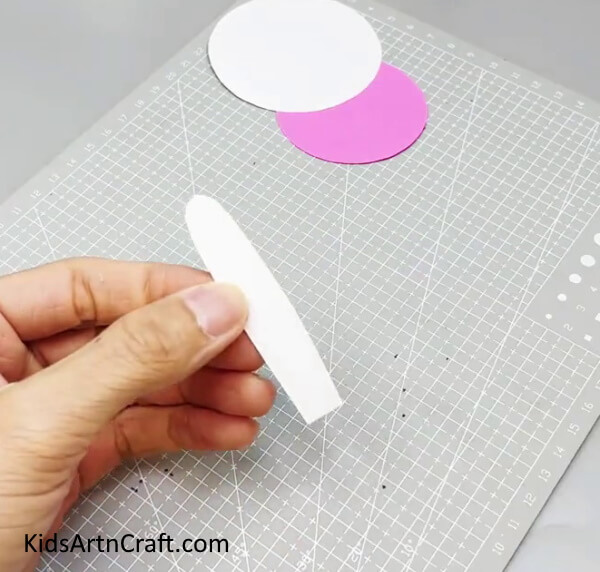 Cutting Out An Ear Of Bunny - A simple paper design of a rabbit for young ones