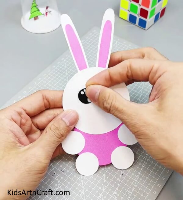 Pasting Eyes Of Bunny - An uncomplicated paper rabbit art for kids