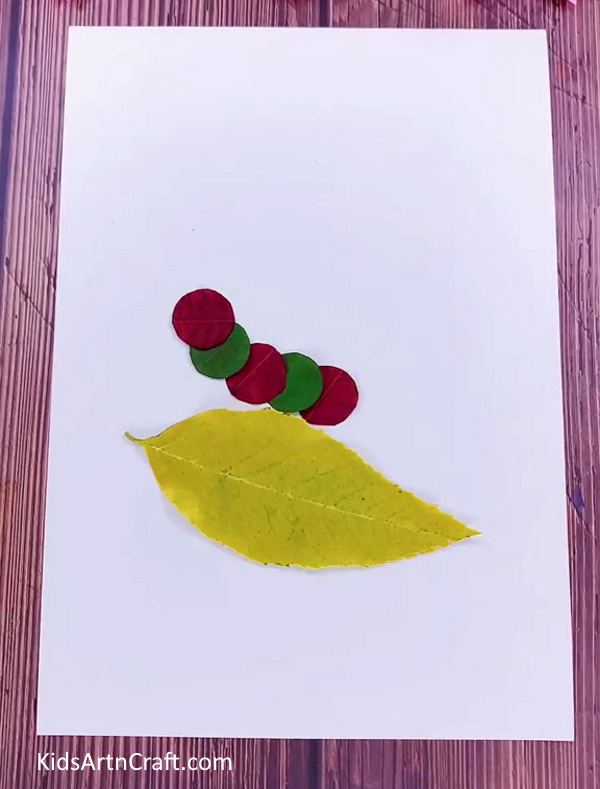 Cutting More Circles From Red And Green Leaf for better Caterpillar Craft