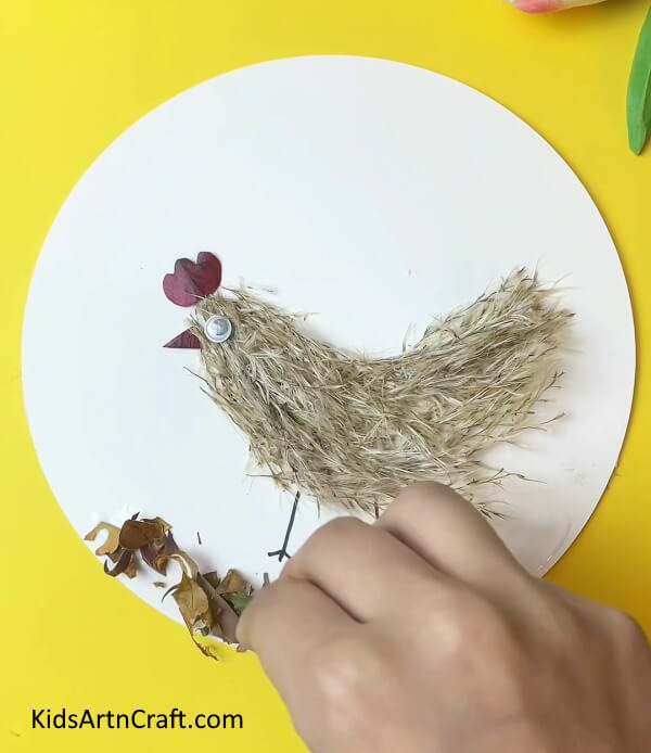 Pasting Tried Leaves under Chicken- An Easy Tutorial for Crafting a Chicken for Young Ones