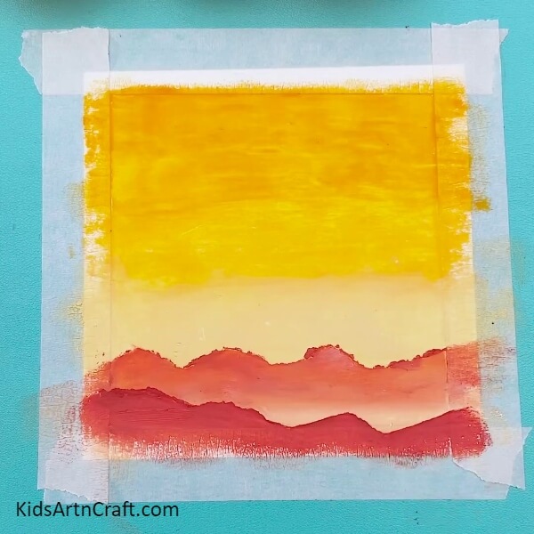 Blend the edges with white- A Step-by-step Guide on Painting a Sunset for Children
