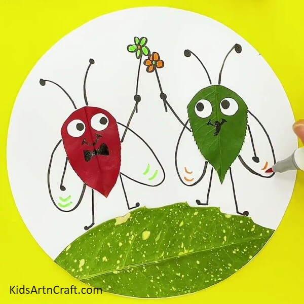 Colouring The Flowers- A Simple Tutorial on Crafting an Insect from Leaves for Children 