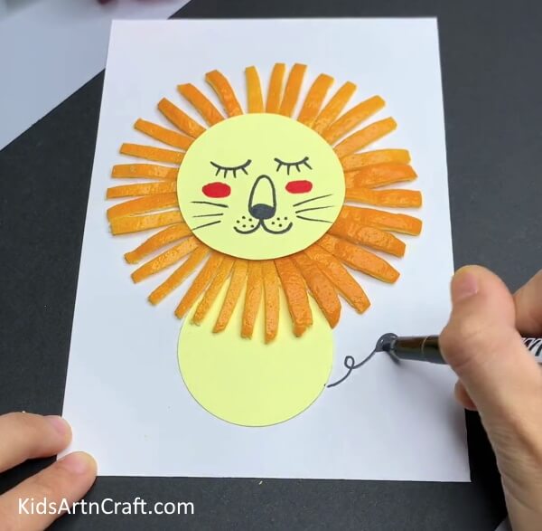 Making Tail- Constructing a lion from an orange peel is an uncomplicated project for kids. 
