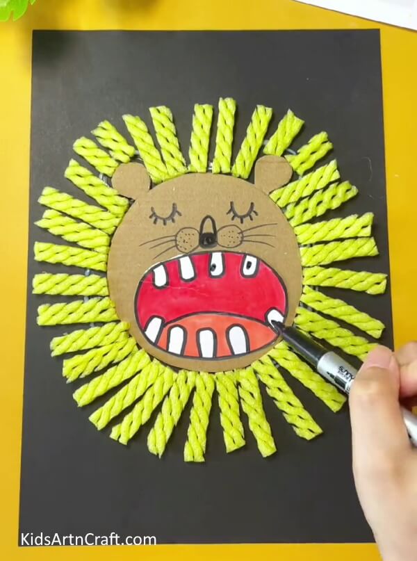 Make Dots On The Teeth-Children can make a zoo animal craft easily