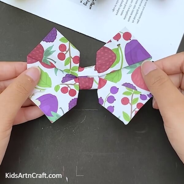 Your Craft is Ready!!- An origami bow craft tutorial for children