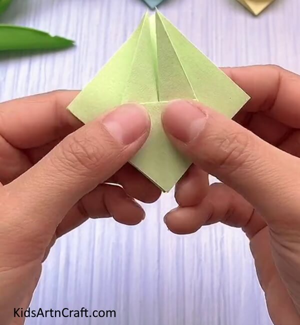Unfolding Back To The Diamond-A quick and easy Rabbit Face Origami tutorial for children.