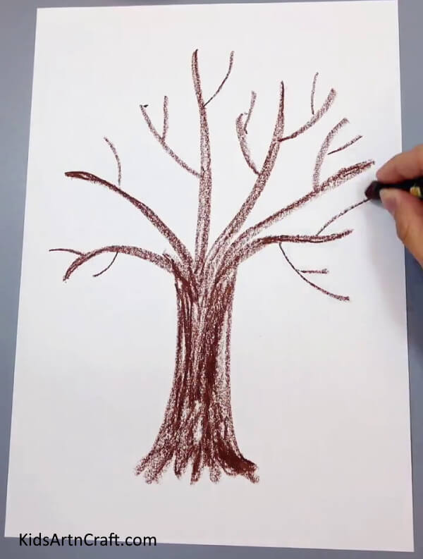 Drawing Tree Using Brown Crayon - A straightforward origami tree with a bird's nest for children. 