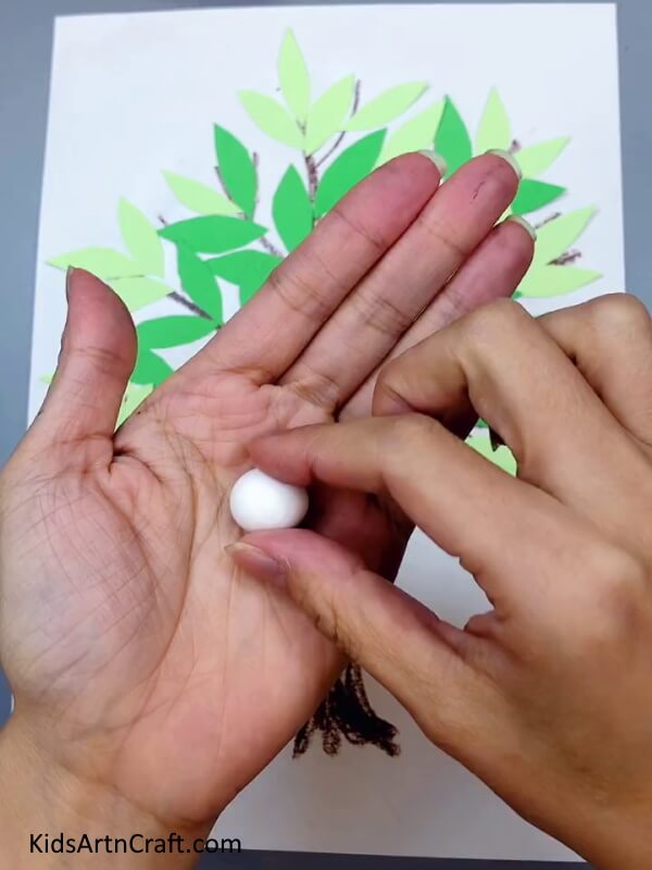 Making Egg Using Clay - A straightforward paper craft tree that includes a bird's nest for children. 
