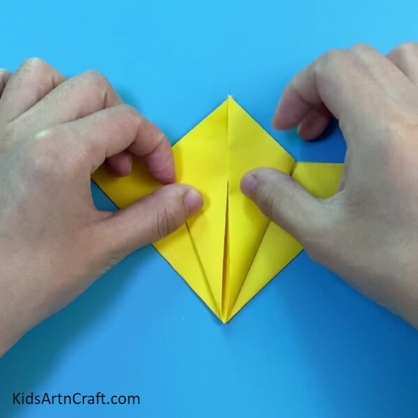 Folding towards the Upper Side- A Tutorial For Constructing a Paper Hen Craft For Beginners 