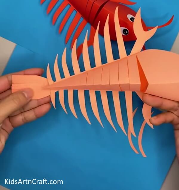 Pasting the Tail- A Simple Guide to Creating a Lobster Craft with Paper for Children 