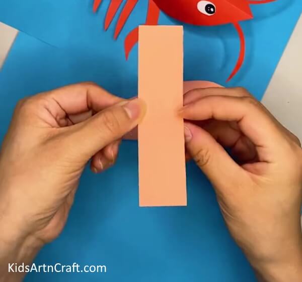 Working on More Sheets of Paper- Crafting a Paper Lobster Project with Kids 