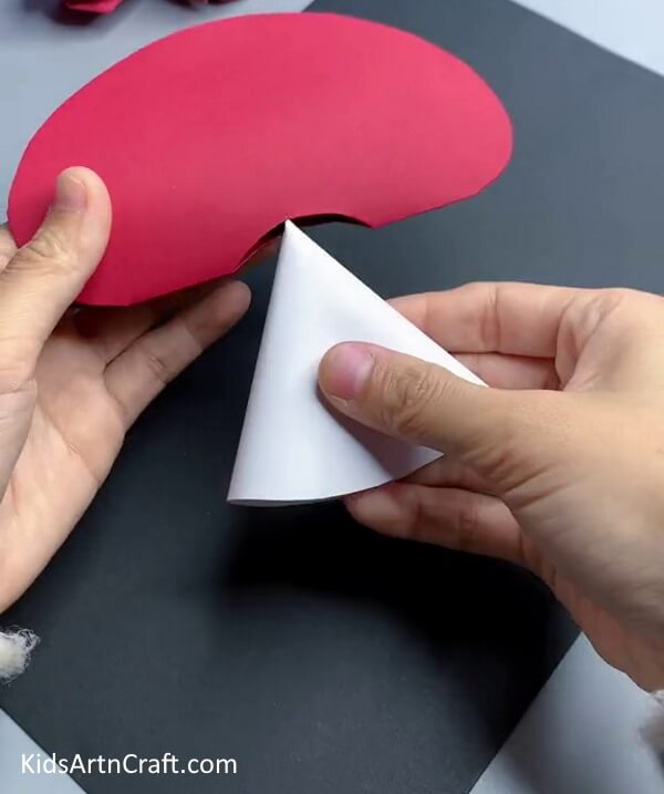 Putting The Cone Inside Crown - A step-by-step tutorial for kids to create a paper mushroom craft