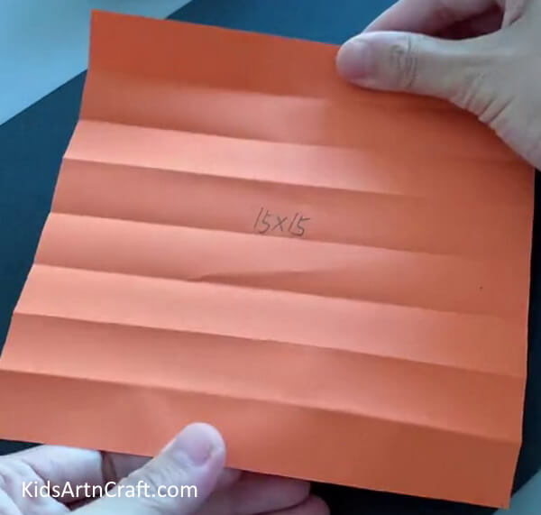 Folding An Orange Paper - An Easy Octopus Creation Guide Using Paper 