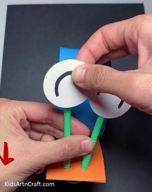Insert The Straw Inside The Holes- A Fun and Simple Paper Snail Craft for the Kids 