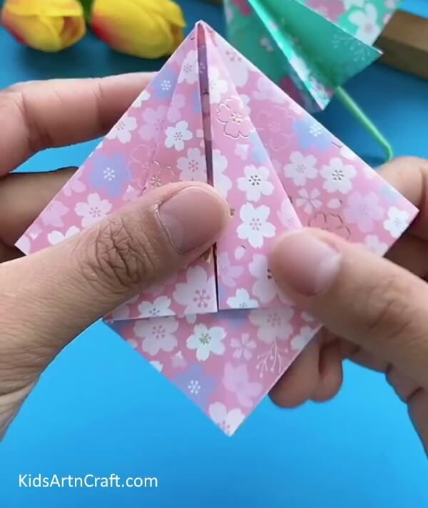 Fold Small Pieces To Make a Triangle-Creating A Paper Umbrella - A Tutorial For Kids