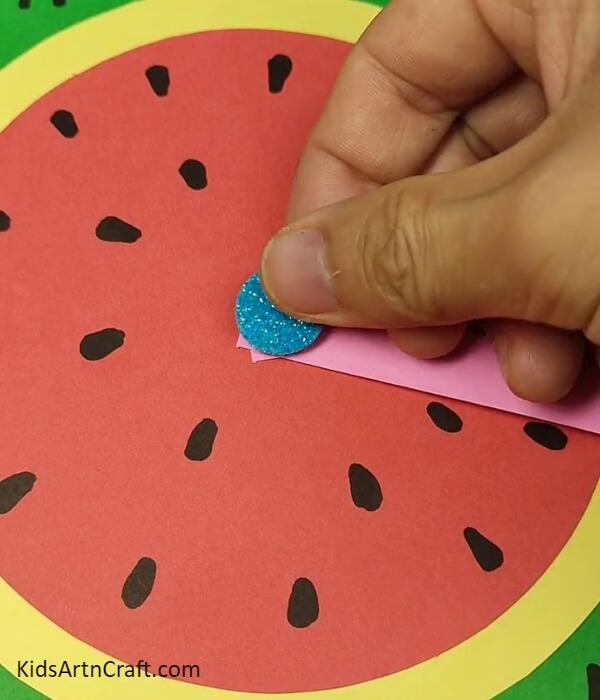 Sealing The Arms-A straightforward craft project that builds a watermelon clock for kids