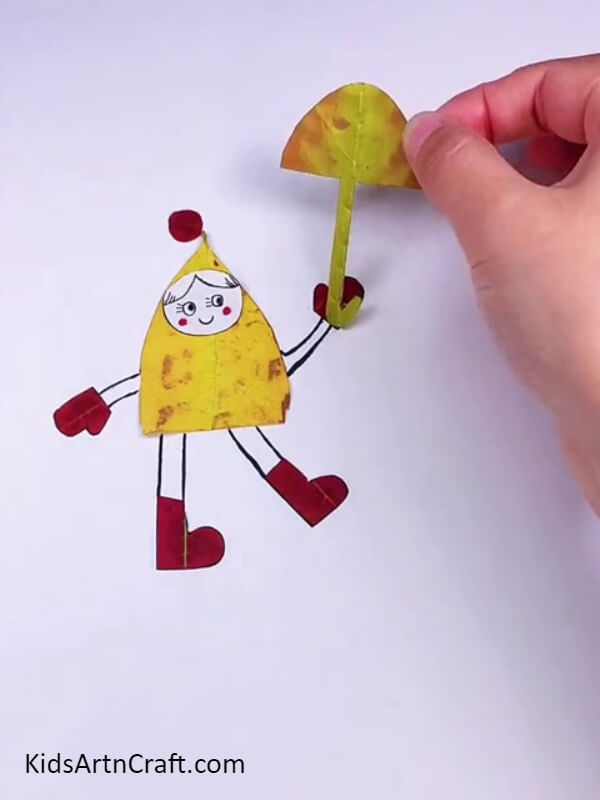 Pasting the umbrella- Fun art projects for a rainy day for kids 