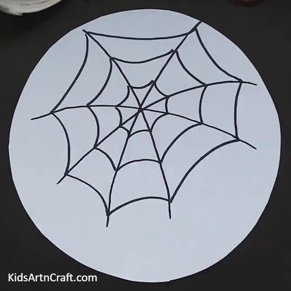 Draw curves on asterisk-An Easy Tutorial To Teach Kids How To Make A Spider Web