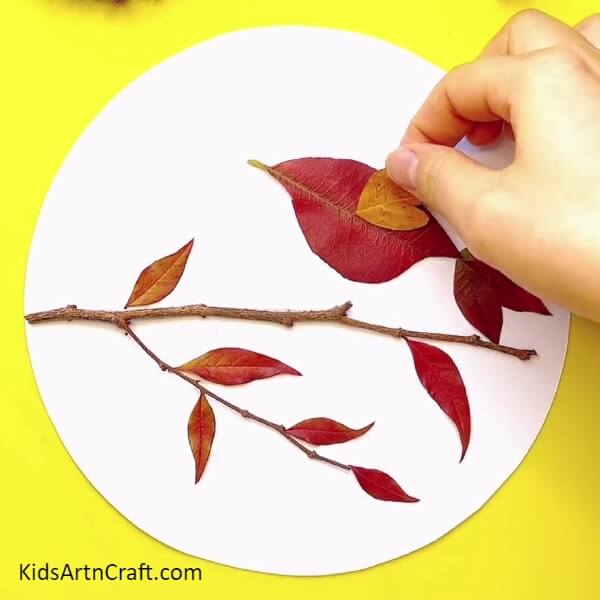 Make Some Wings For The Bird-A Tutorial Demonstrating How To Make A Fall Leaves Bird Craft For Kids