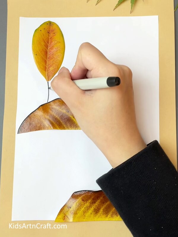 Drawing lines- Crafting Fall Leaves With Kids - An Easy Tutorial