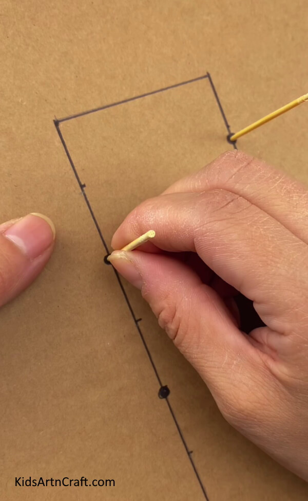 Inserting Small Bamboo Sticks - Make A Football Symbol In A Few Easy Steps