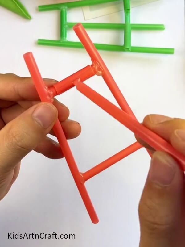 Connect Another Straw To The Structure-A Simple Mobile Stand Creation Using Straws for Children 